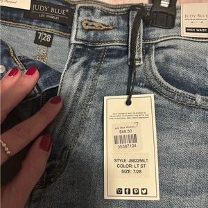 Judy Blue Women's High Waist Distressed Cropped Jeans - Light Blue. Size 7/28